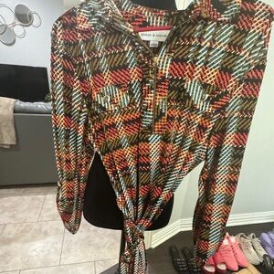 Women multi colored mid length dress. Sleeves are elbow length.Size L